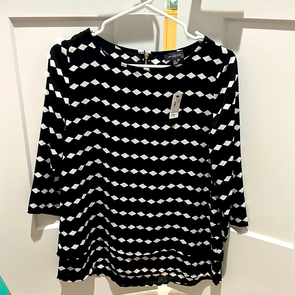 The limited 3/4 sleeve top